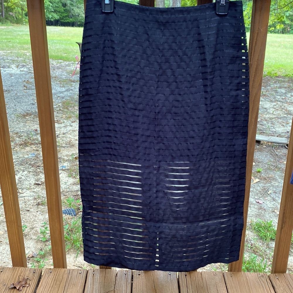 NWT JOA Los Angeles skirt size medium Black with alternating horizontal stripes.
